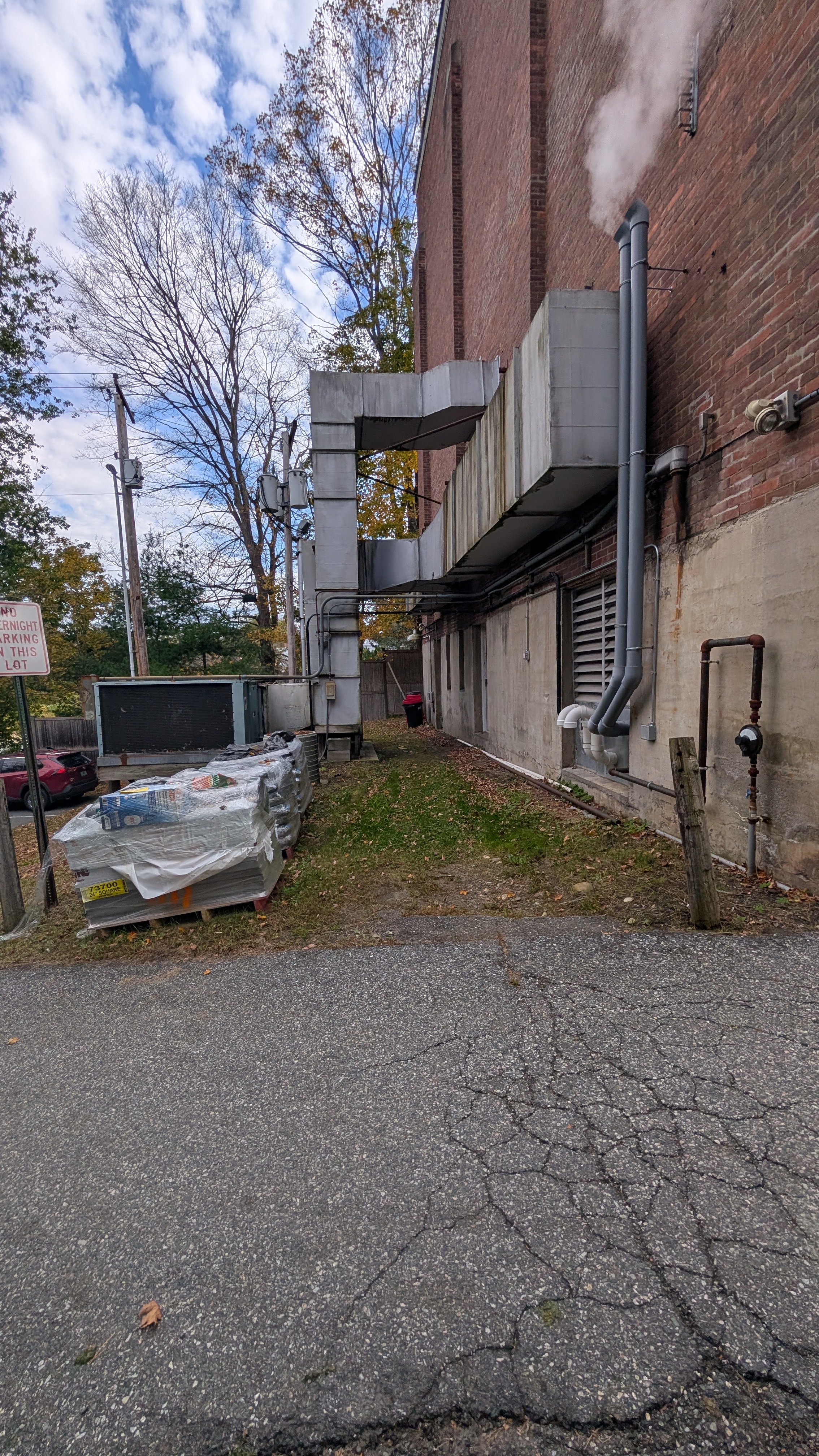 Green room access area beside the Woodstock Town Hall Theatre, showing the outdoor walkway and space planned for improvements.